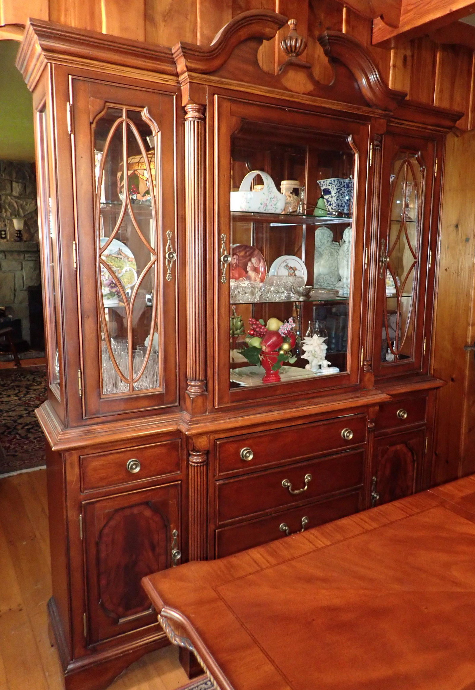 Breakfront: Two Piece Break Front is apprx 18 1/2" x 65" x 87 1/2" tall. Buyer responsible for taking apart and bringing help to load. Does not include the items in it. PICK UP IN AFTERNOON ONLY !