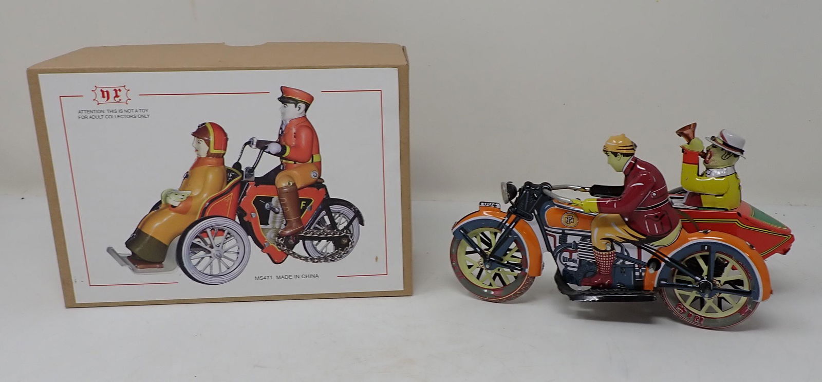 Chinese Tin Wind Up Toy Motorcycle: Approx 7 1/4" long. Comes with wrong box