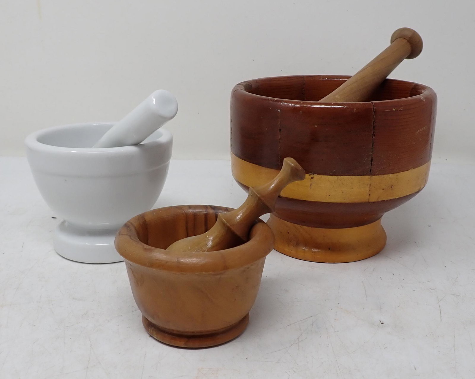 Wood / Ironstone Mortars & Pestles: Largest mortar is apprx 5 1/4" in diameter and 4 1/4" tall.