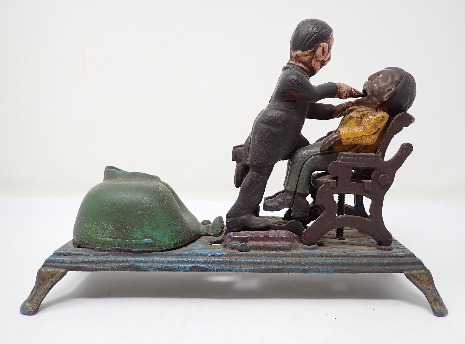 Cast Iron Dentist Mechanical Bank (1 of 3)