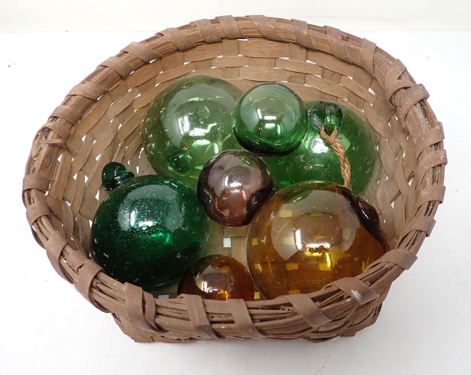 Glass Fish Net Balls: Largest are approx 3 3/4" In diameter and small ones are approx 2"