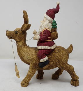 Resin Santa on Deer: Approx 11" long and 12" tall