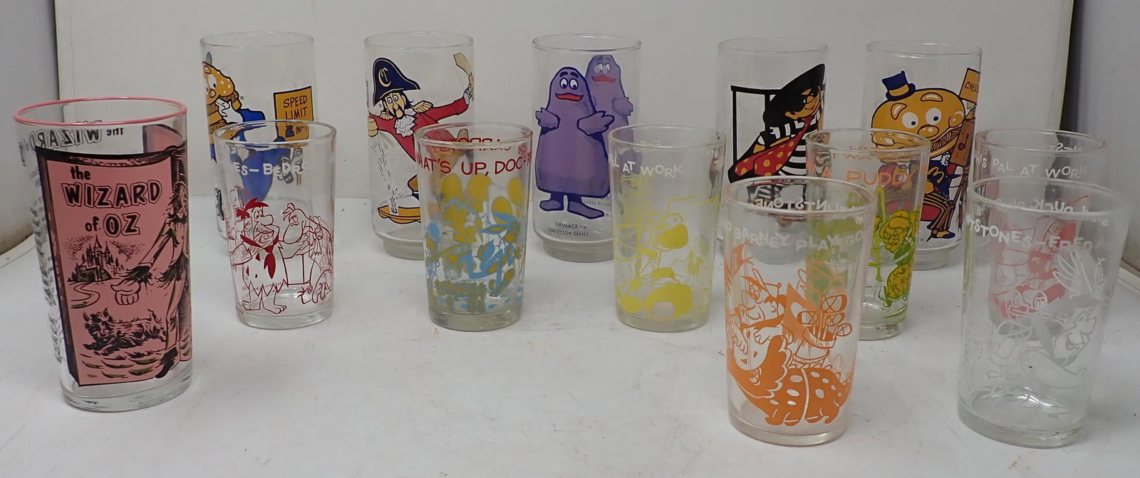 Vintage McDonalds Flintstones Wizard of Oz Glasses: Largest drinking glass is approx 5 1/2" tall.