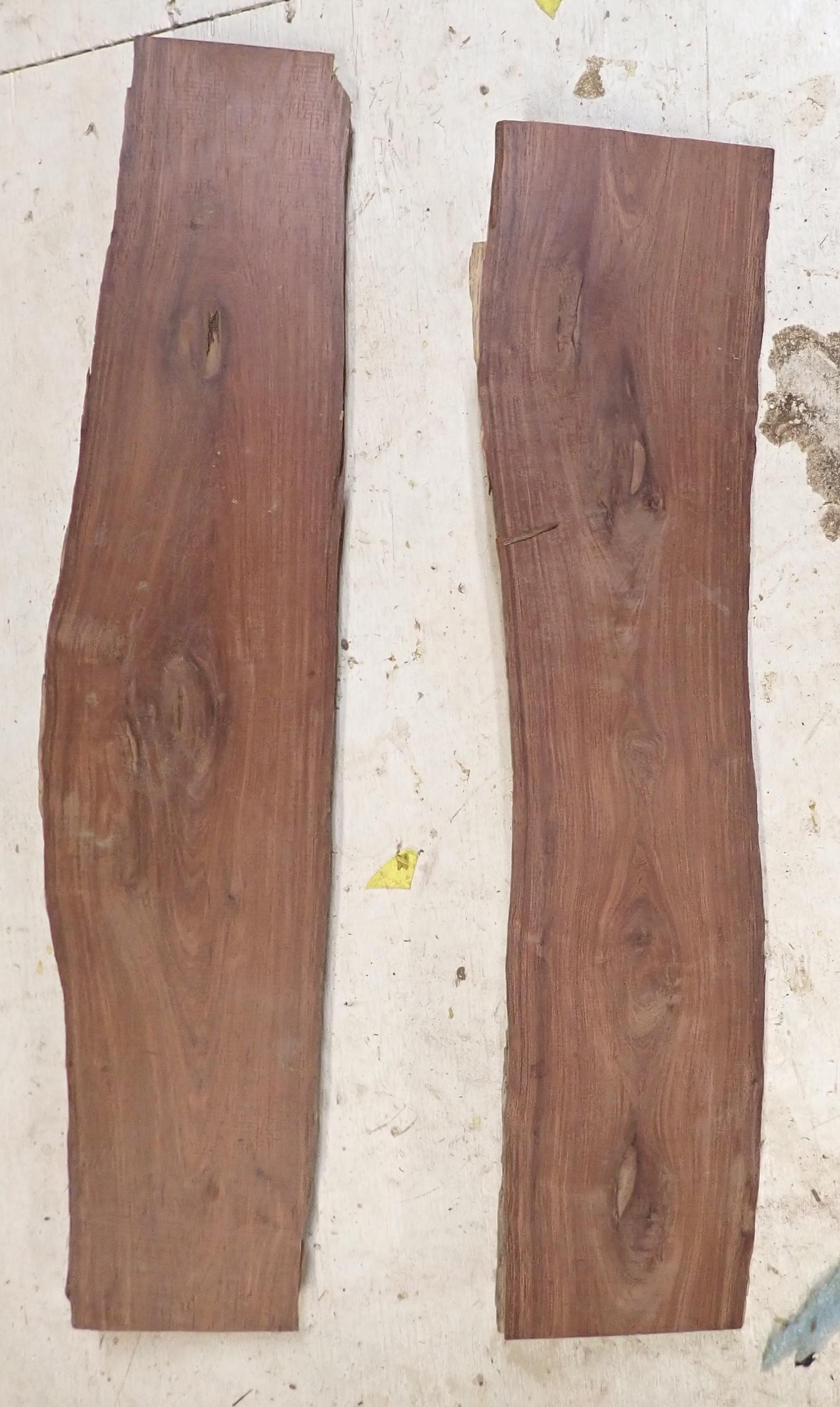 2 Pieces of Rosewood: Largest is approx 1 1/2" x 6 3/4" ( at widest point) x 29 3/4" long. Believed to be rosewood. Sold with no guarantees