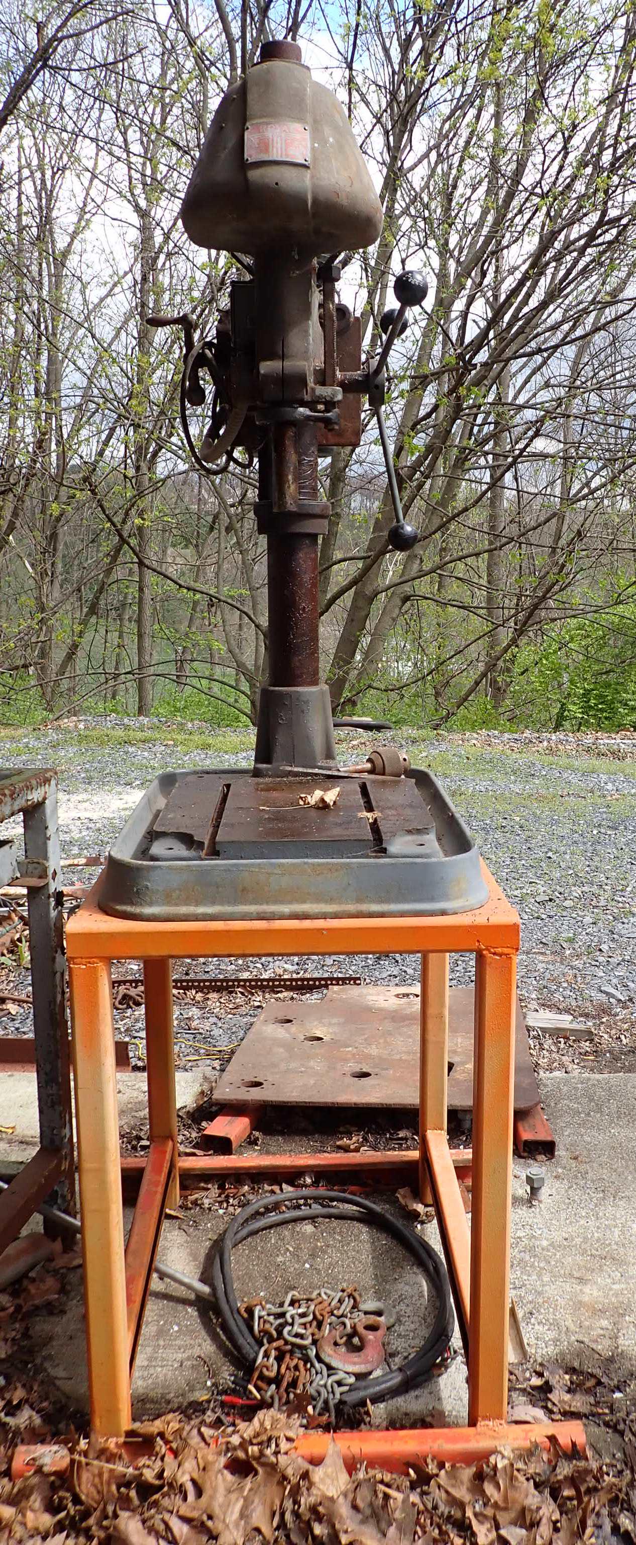Royal Drill Press: Approx 9" depth. Comes with base, chain, and wire under it. Bring help / equipment to load.