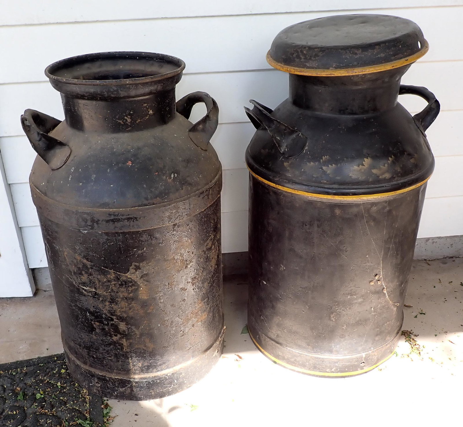 2 Milk Cans and 2 Sleds (1 of 2)