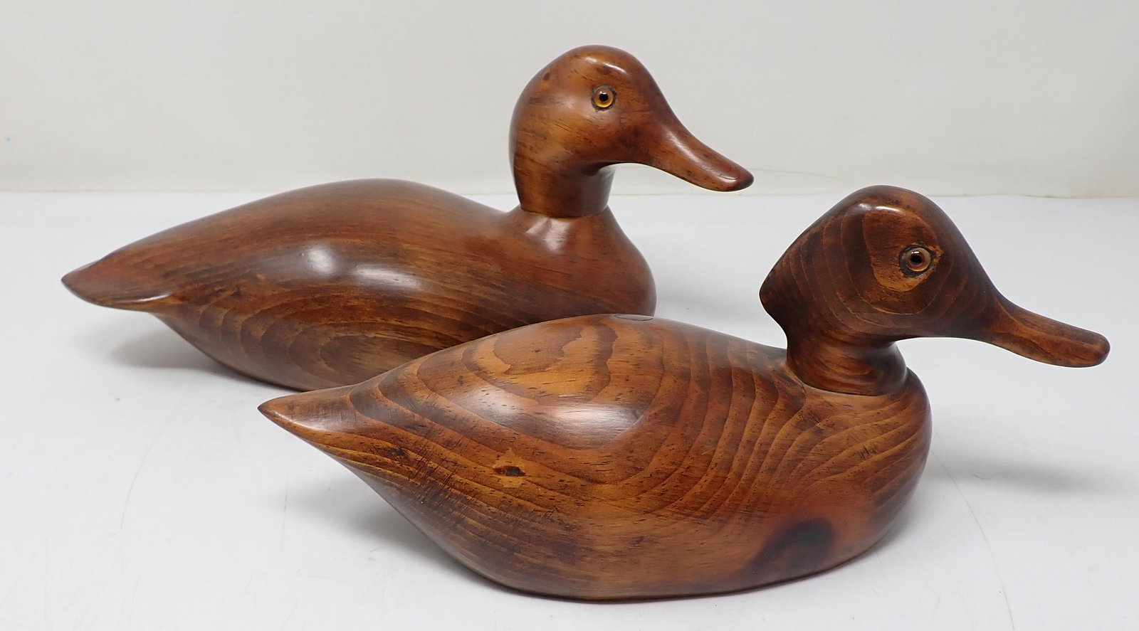 2 Wooden Duck Decoys: Largest is approx 11 1/2" long and 5 1/2" tall