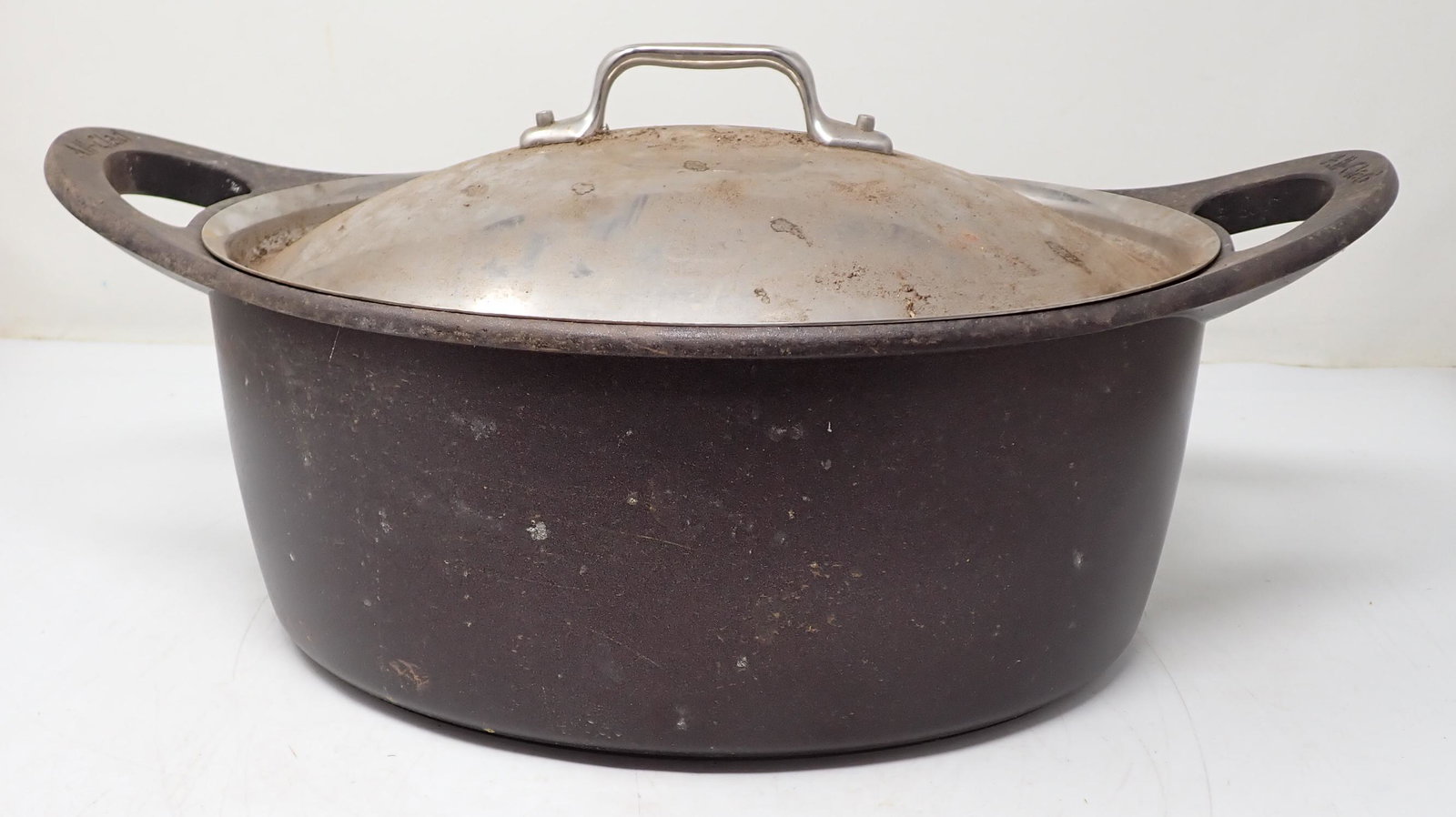 All Clad France Roaster: Approx 9 3/4" x 16" x 8 1/4" tall.