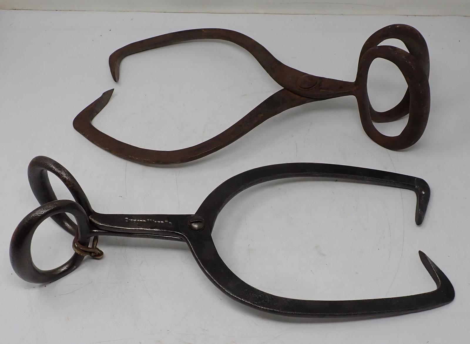 2 Pair of Ice Tongs Gifford Wood: Gifford Wood Tongs in front are approx 7" x 16"