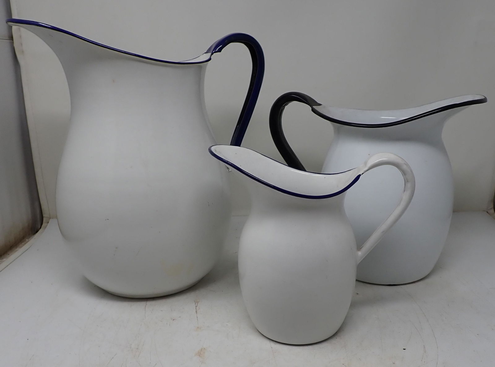 3 Enamel Water Pitchers (1 of 3)