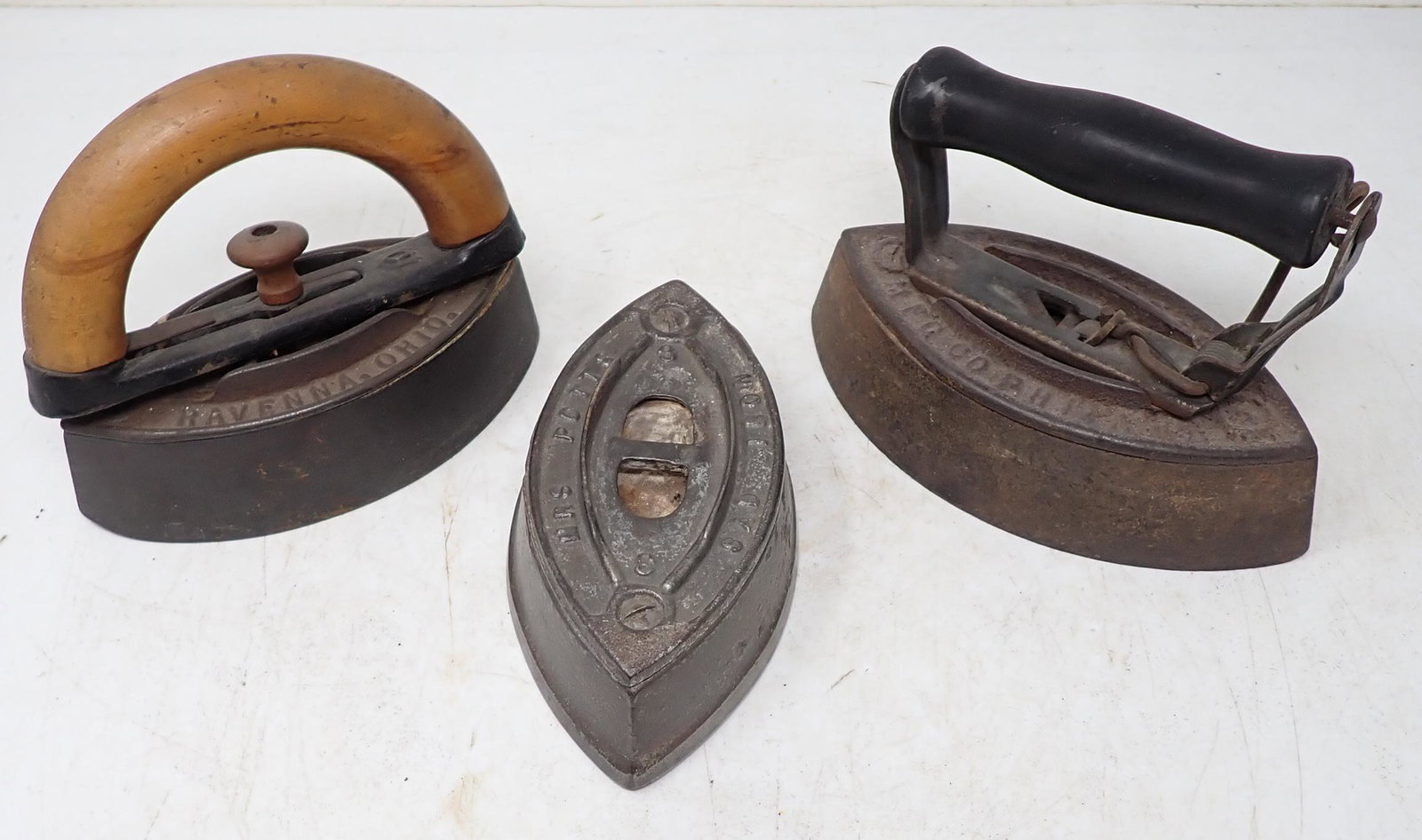 AC Williams & Mrs Potts Sad Irons: Middle one is approx 6" long. Could not make out the maker on the right one.