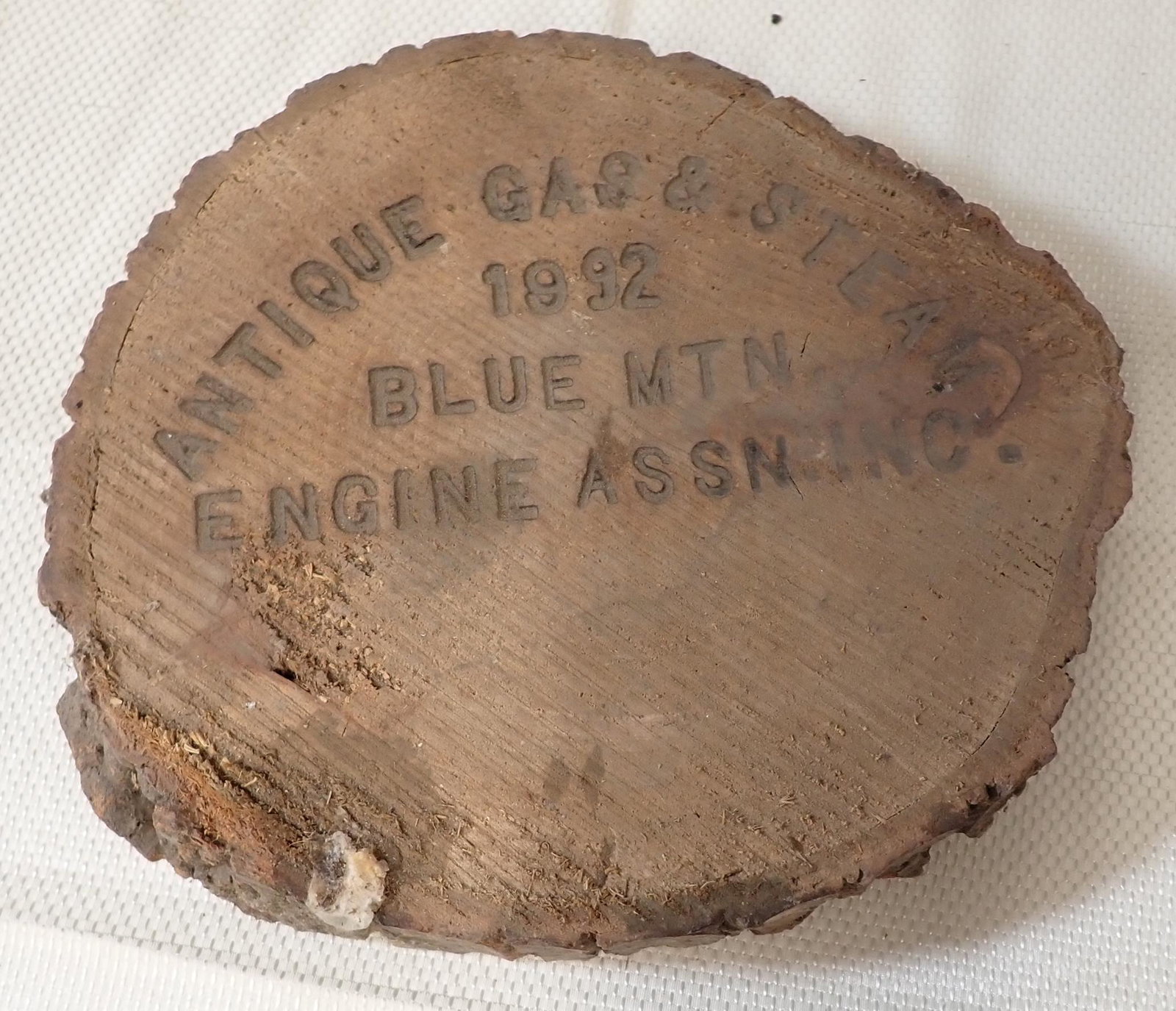 1992 Blue Mountain Steam Engine Carved Log: Approx 9" x 10" x 1 1/2" thick.