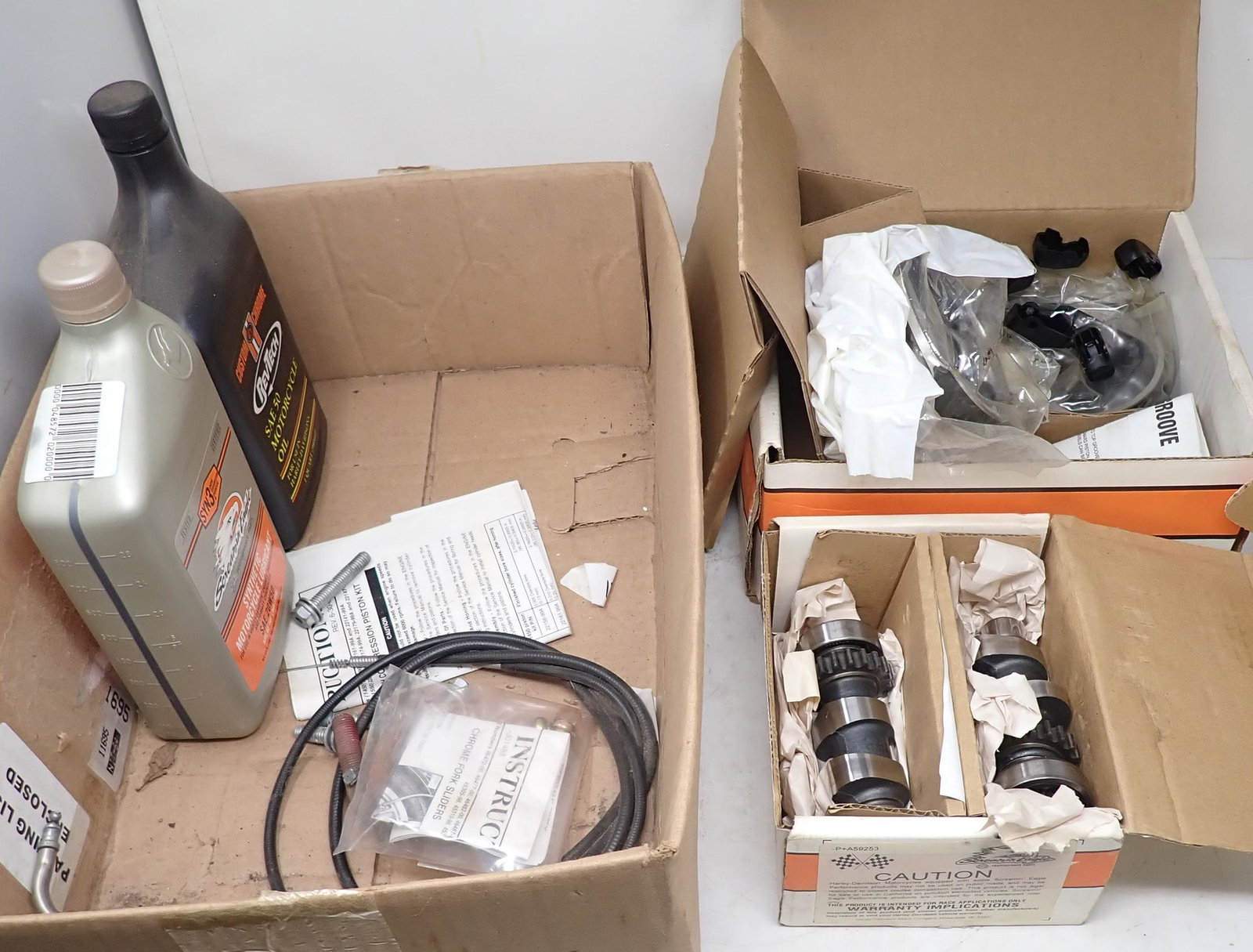 Harley Davidson Piston & Cam Kits: Also includes 2 full quarts of oil. Kits are not guaranteed to be complete