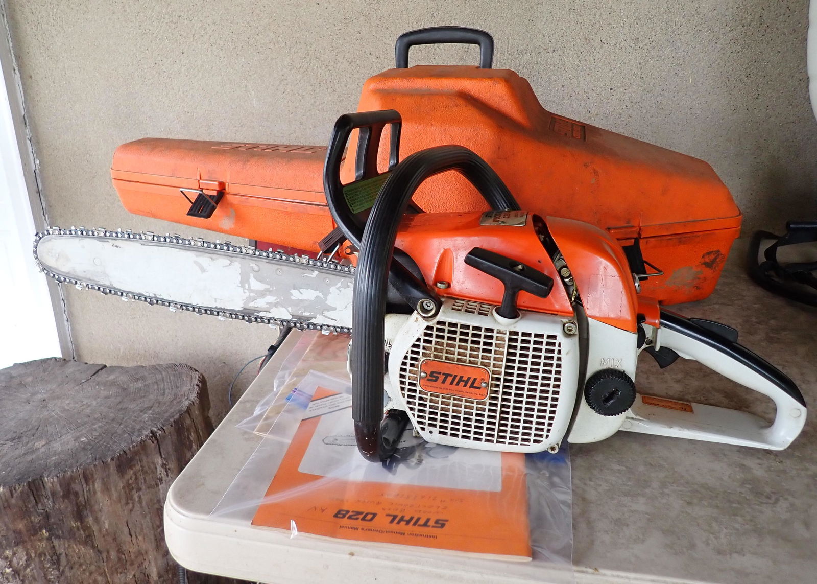 Stihl Wood Boss 028 AV Chainsaw: Has 18" Bar, comes with case and extra chains.