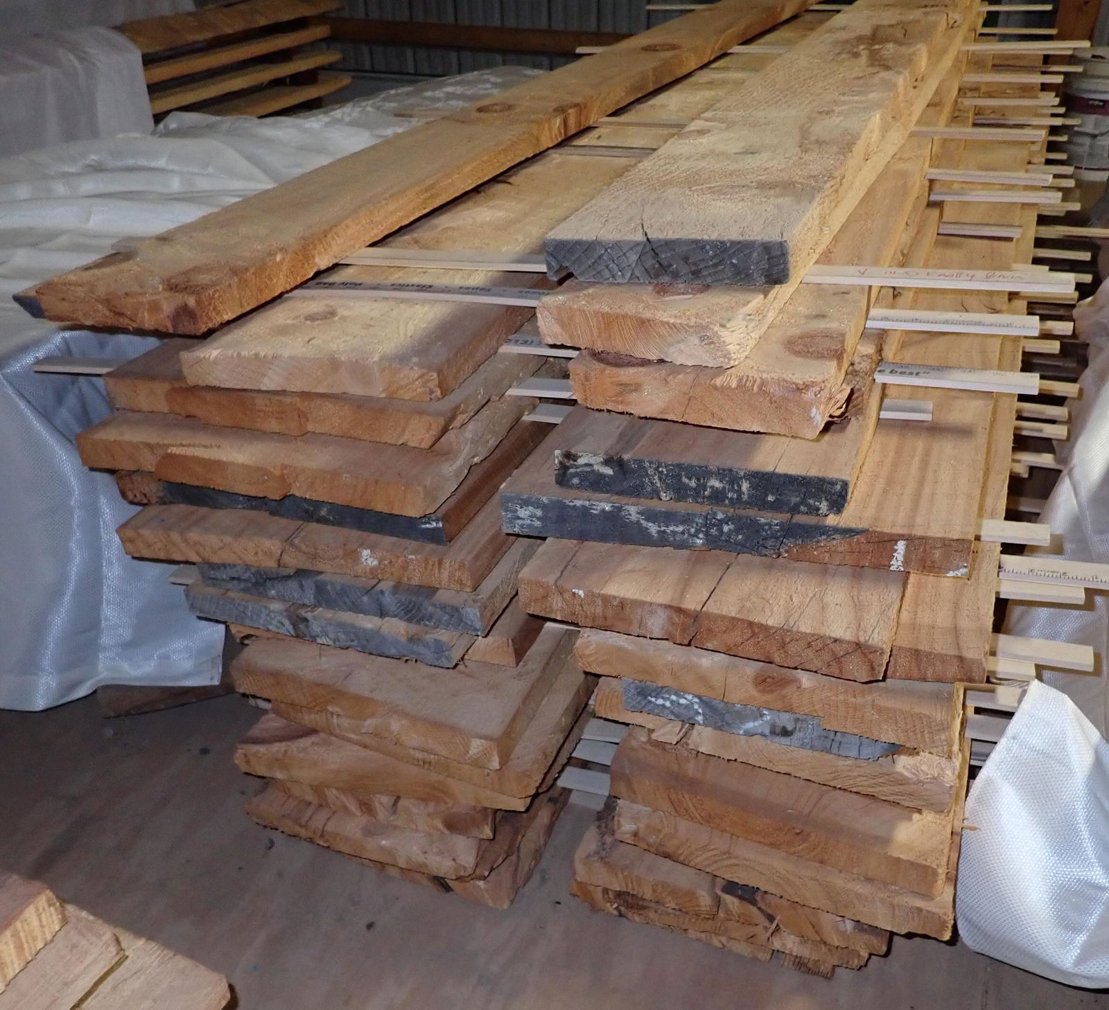 2 Piles of Knotty Pine Lumber (1 of 4)