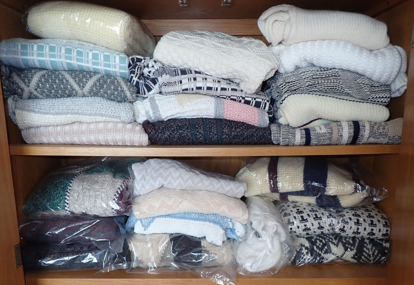 Dresser Full of Sweaters: Lots of NWT , Looked at one and it was a medium. NO SHIPPING ! Buyer to remove from second floor.