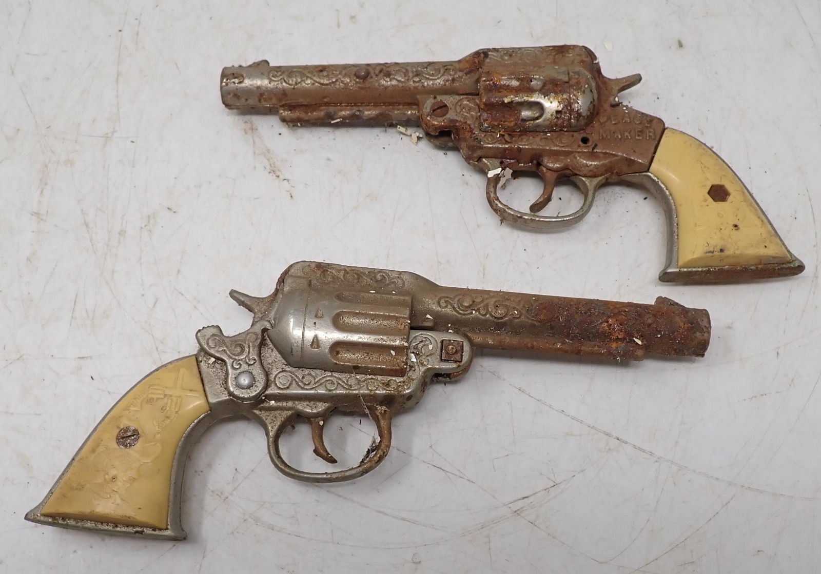 2 Cast Iron Peace Maker Cap Guns (1 of 6)