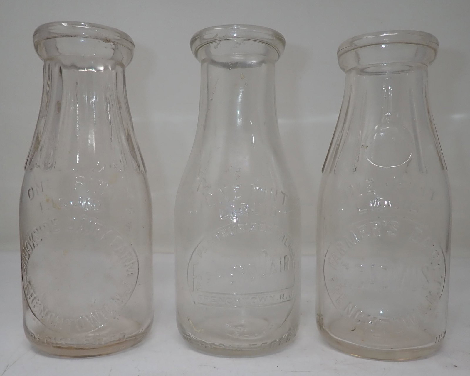 Frenchtown NJ 1 Pint Milk Bottles: C Cadmus Farmers Dairy , Brookside Dairy, and one just marked Farmers Dairy Frenchtown.