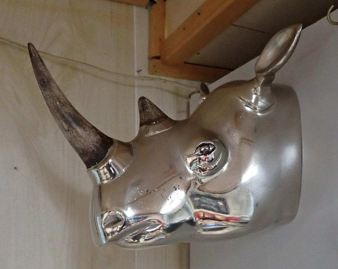 Cast Aluminum Rhinoceros Wall Hanger: Sticks out approx 10" from wall and is 9" tall. Horns are wooden