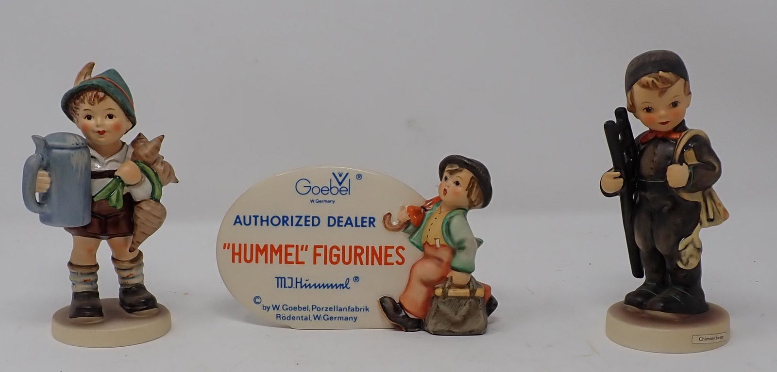 Hummel Figurines & Dealer Sign: Approx 5 1/2 " tall getting all pictured