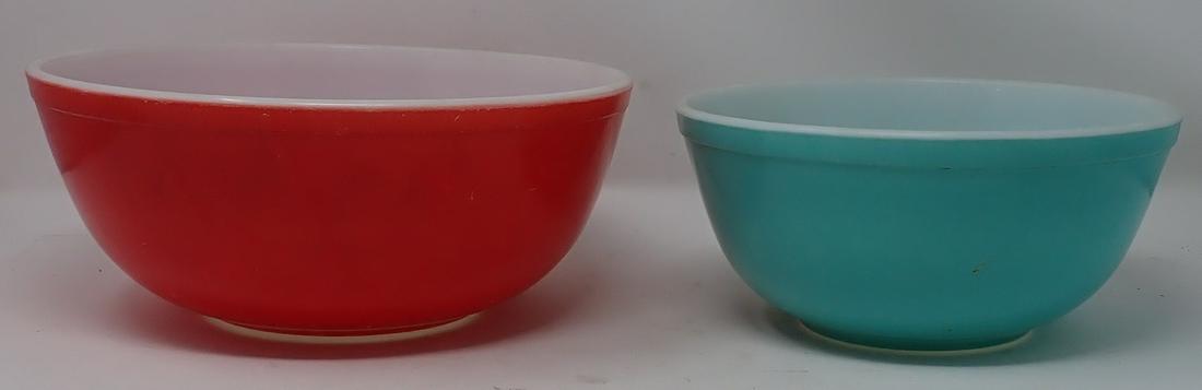 2 Pyrex Nesting Bowls: Largest is approx 10 3/8" in diameter and 4 1/2" tall.