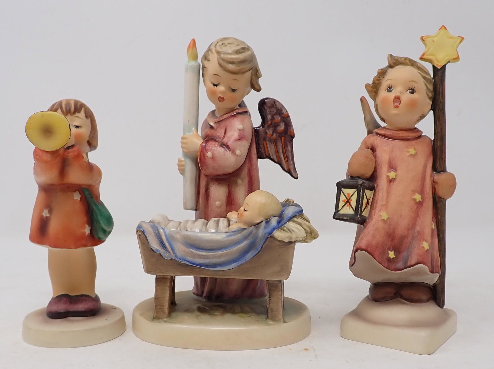 Hummel Figurines: One in center is approx 6 1/2" tall