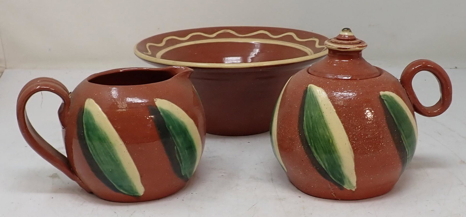 Dorothy Long Redware Sugar Creamer & Bowl: Eldreth redware pottery. Bowl is approx 8" in diameter and 3 1/2" tall