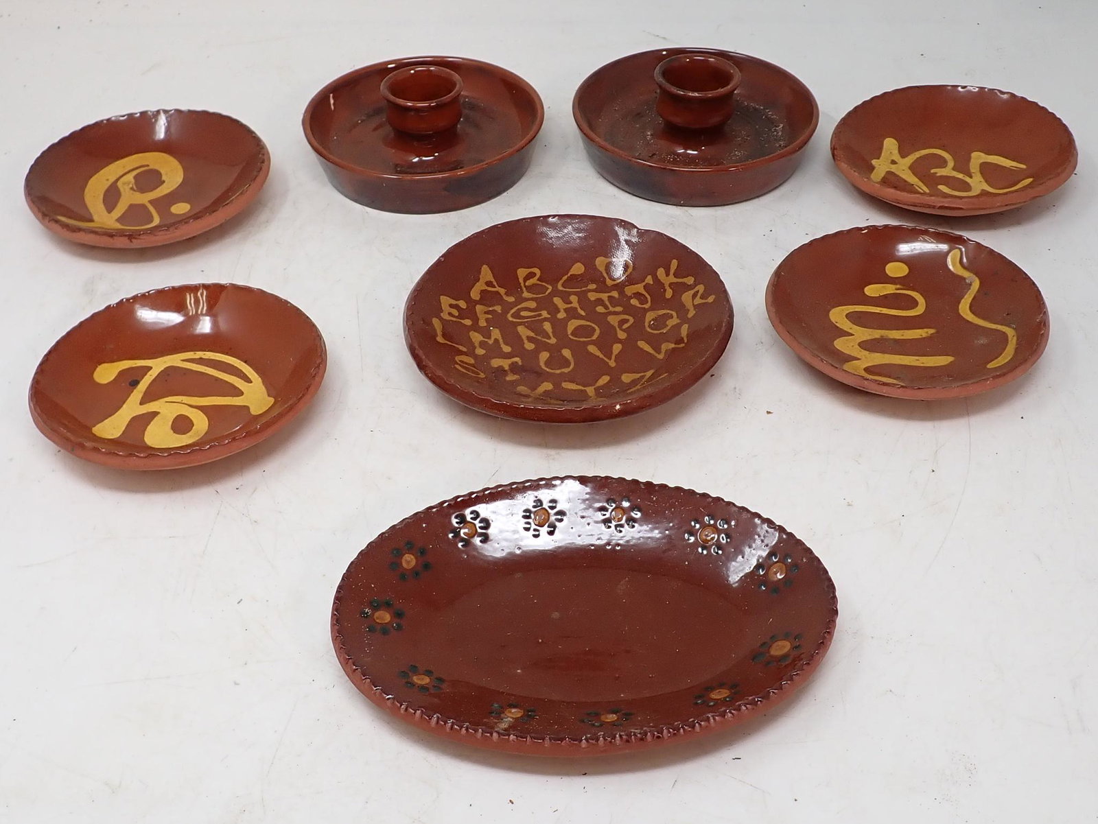 Misc Redware Pottery: Candle holders are approx 4 1/2" in diameter