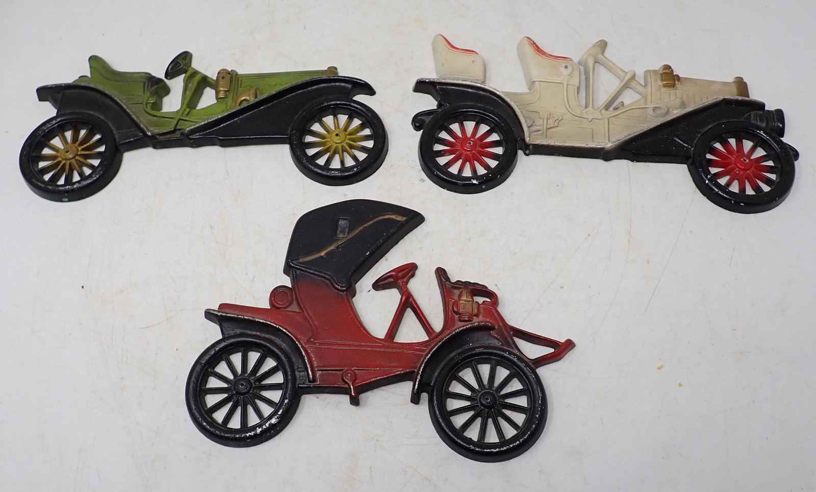 Midwest Aluminum 1910 Buick 1909 Hupmobile Plaques: Car wall plaques. Longest are approx 10 1/2"