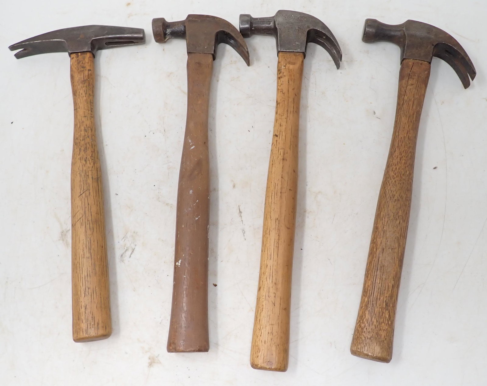Pexto & Stanley Hammers: Stanley 7oz on right is approx 11 1/2" long. Head is apprx 3/4" x 3 7/8"