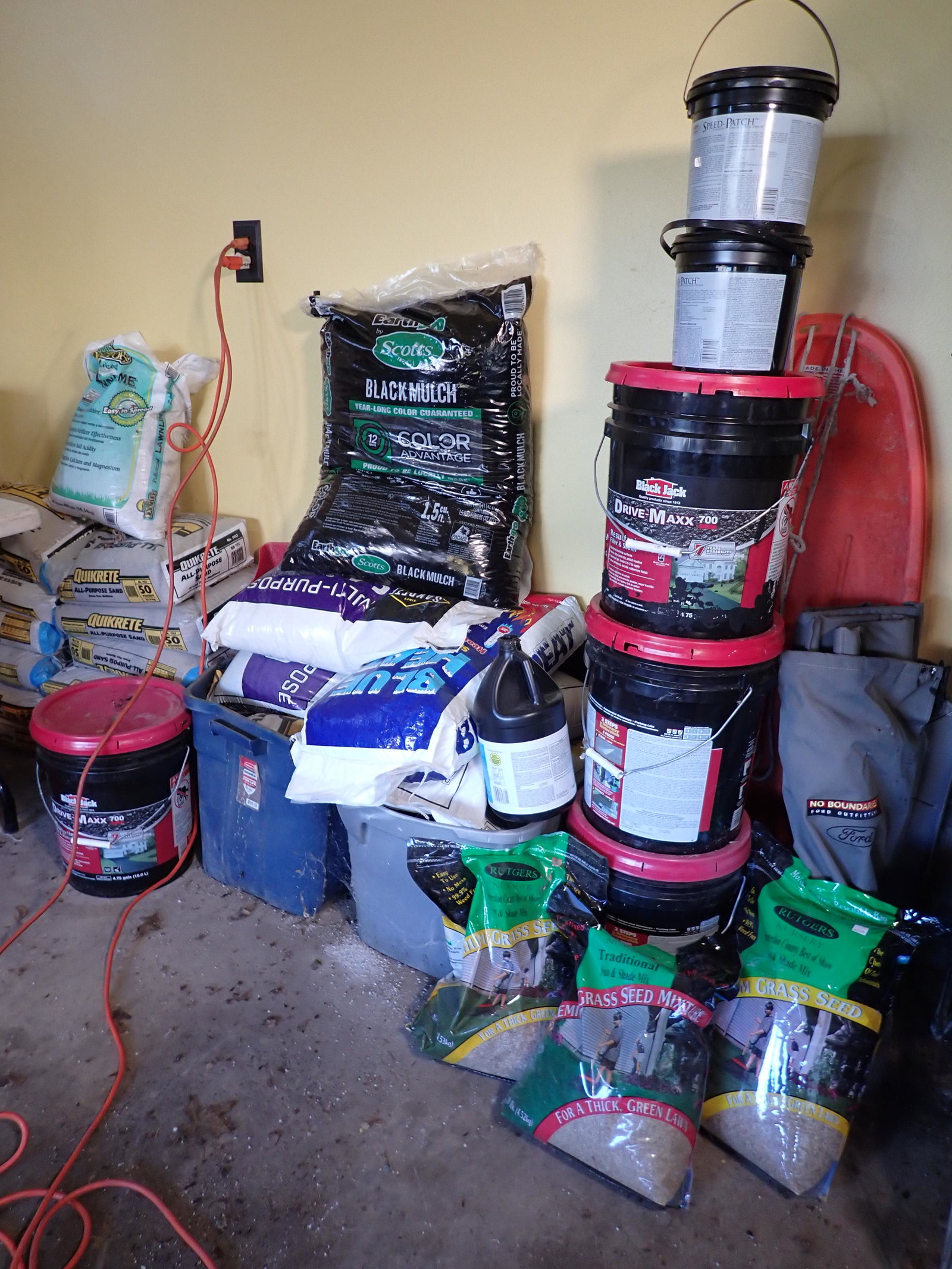 Quikrete Sand Rock Salt Grass Seed Driveway Sealer: Containers in last pic are bird seed. One 5 gallon driveway sealer is almost empty. Lot includes all pictured on floor. Take what you want and leave the rest. NO SHIPPING