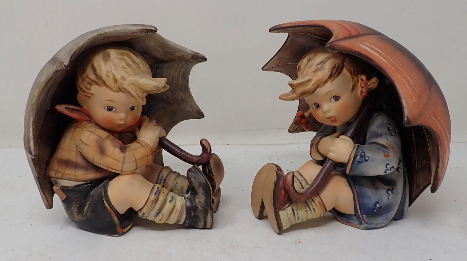 Hummel Goebel Umbrella Boy & Girl: Approx 5 1/4" tall.