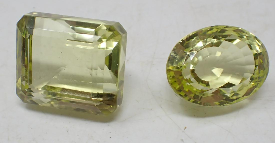 Lemon Quartz: Getting both pictured. One on left is approx 7/8" x 1" x 3/4". Paper with them says 151cts. Sold as pictured, with no guarantees