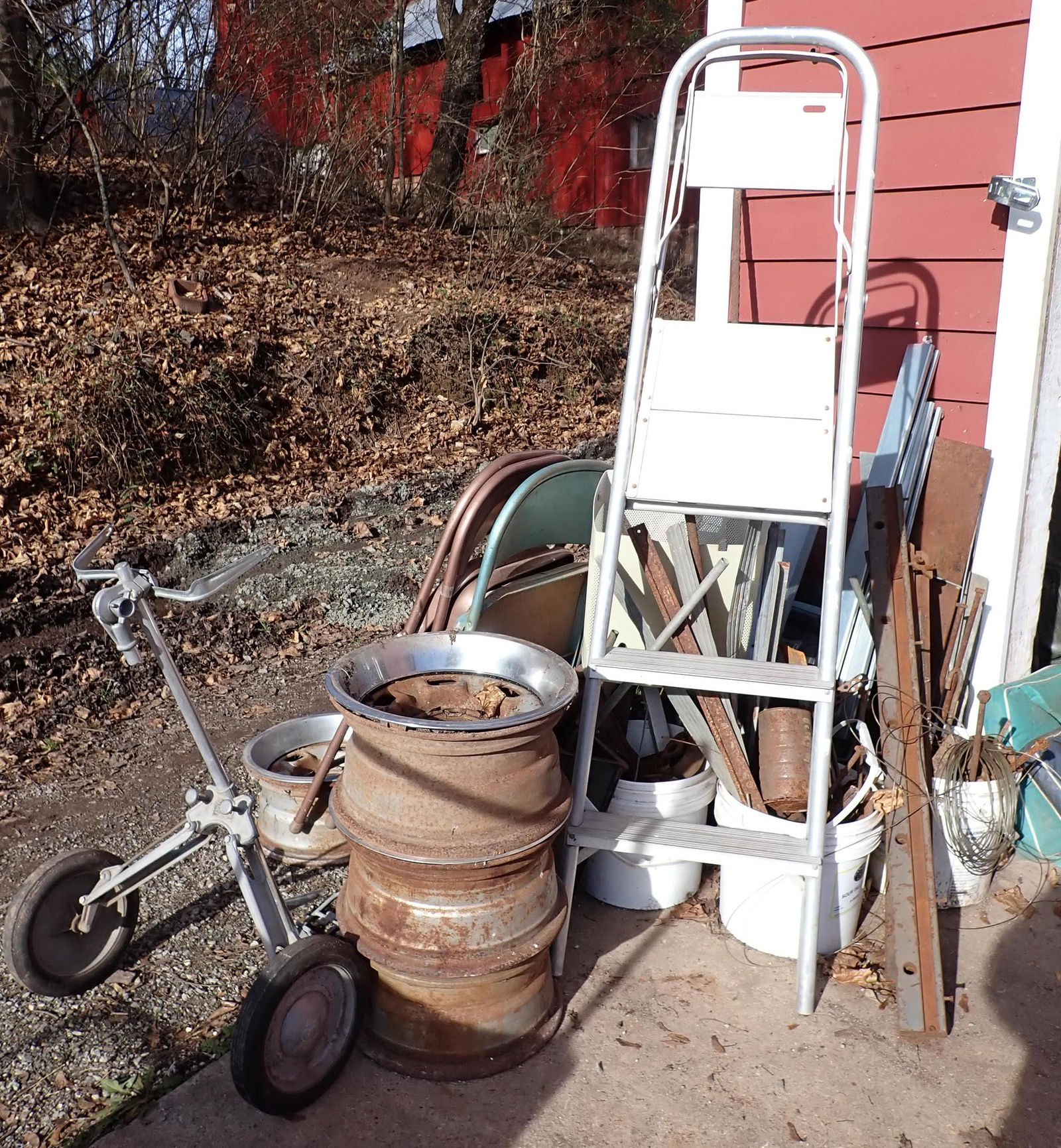Scrap Iron: Items in this lot are located outside. If there is snow on the ground for pick up day, it is the buyers responsibilty to uncover, or dig out of ice. Does not include cart that scrap is pictured in , i
