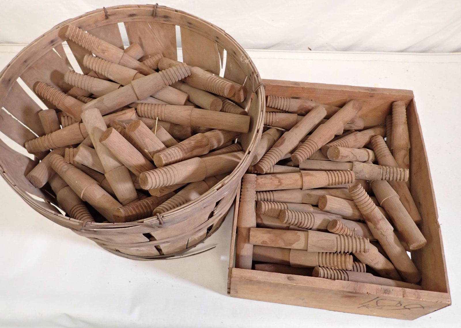 Basket and Crate Full of Wooden Pegs (1 of 3)