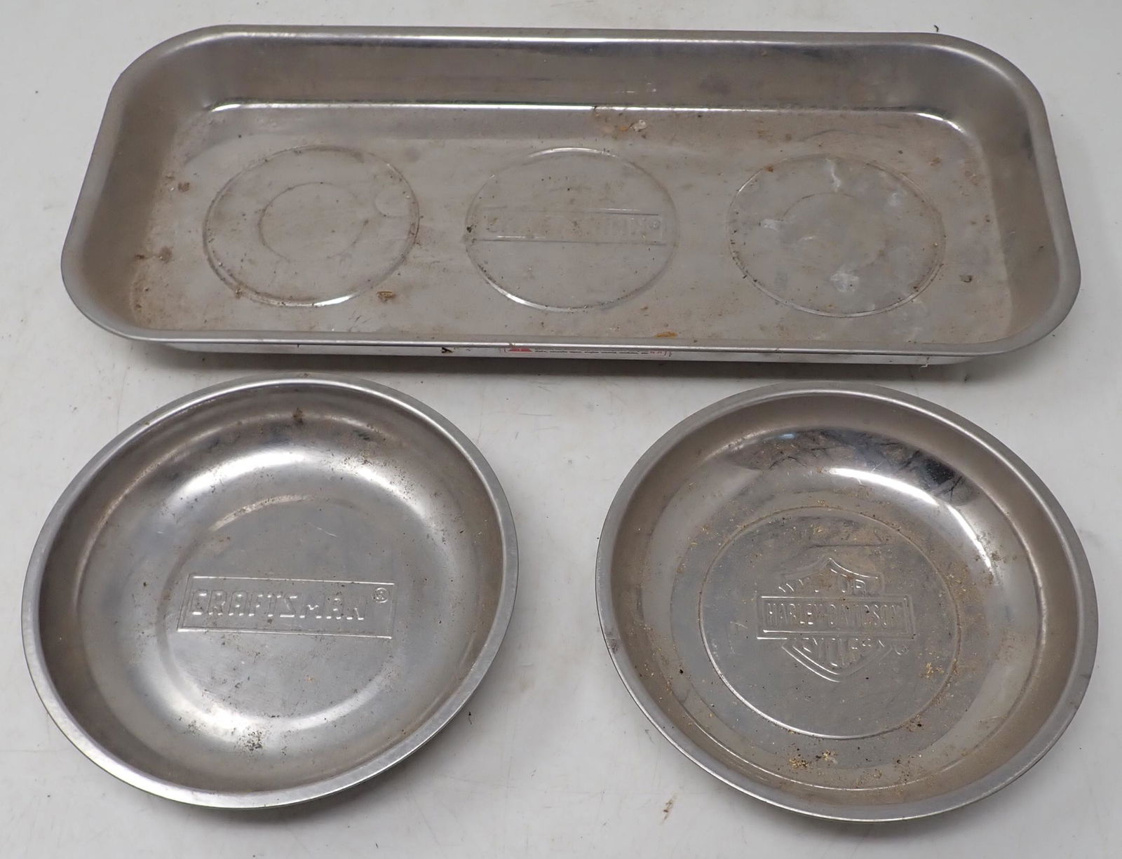 Harley Davidson & Craftsman Magnetic Trays: Front right one is Harley. The large Craftsman one is apprx 6 1/4" x 14"
