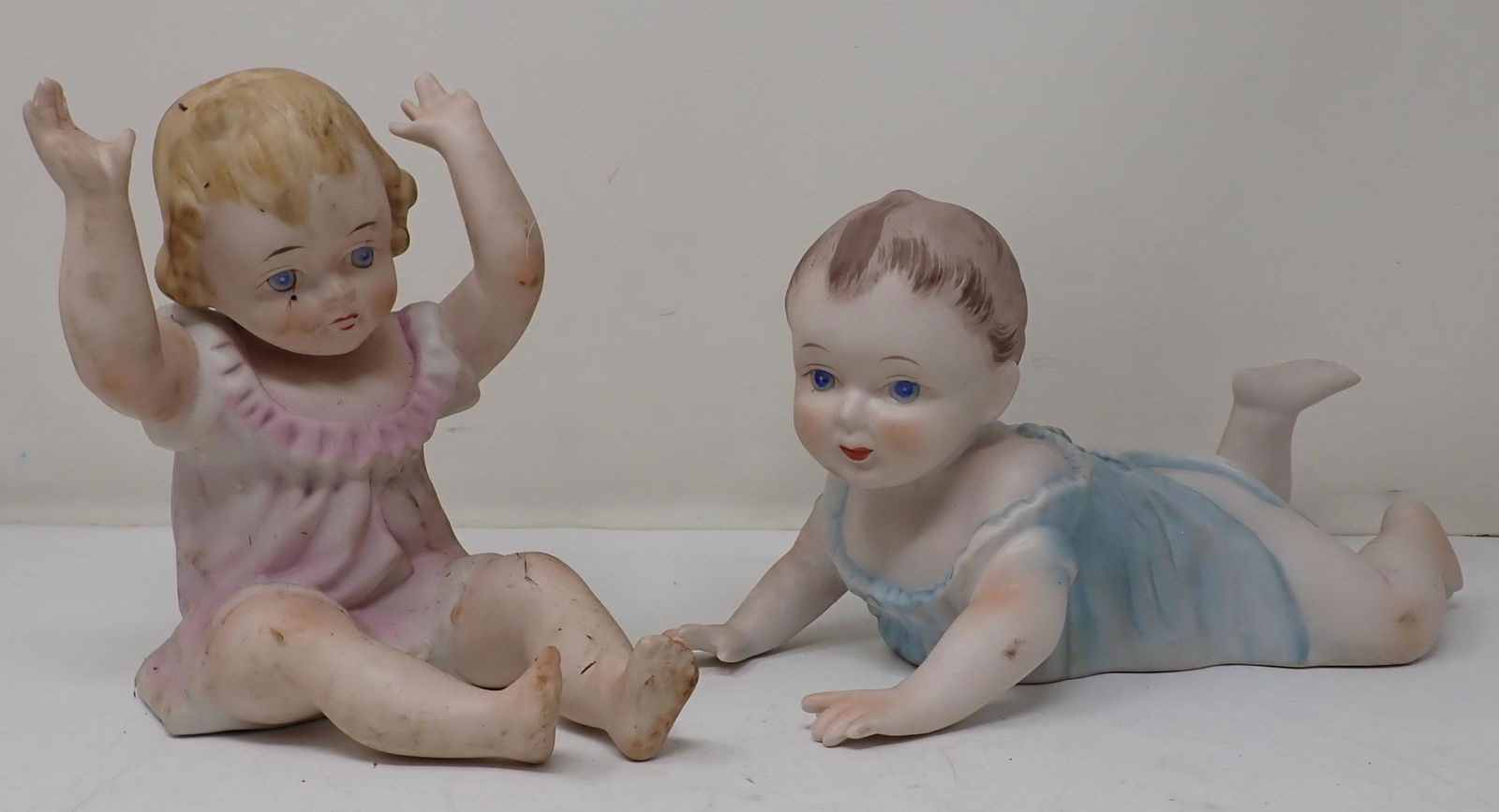 Bisque Porcelain Piano Babies: Tallest is approx 7"