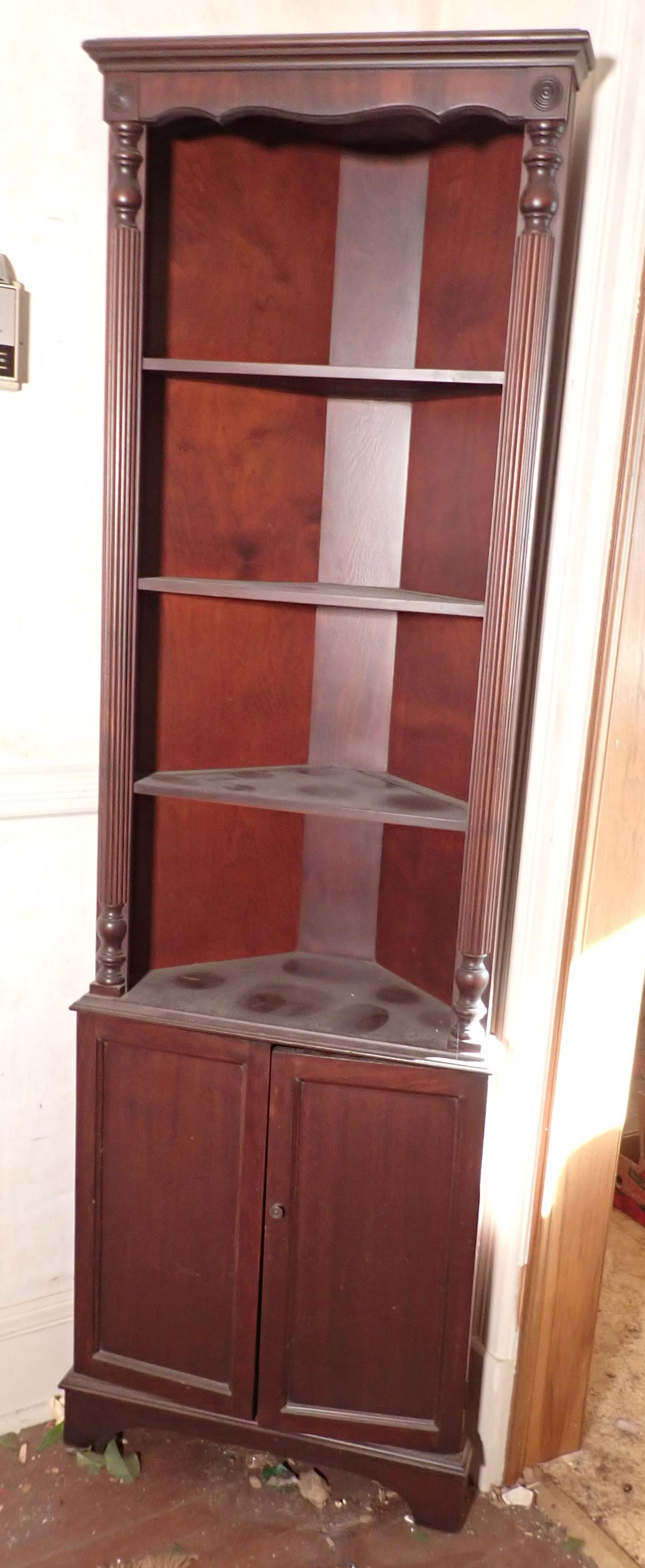 Mahogany Corner Cabinet: Apprx 21" across, 12" deep, 67" tall. Bring help to load. No shipping