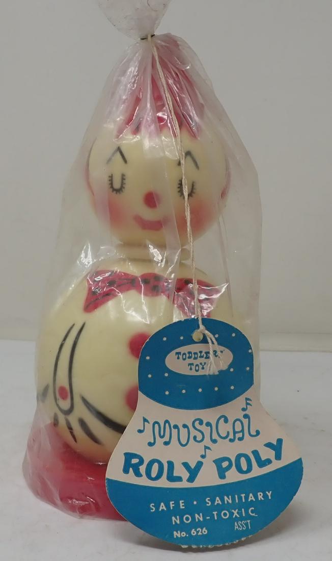 Roly Poly Musical Stahlwood Clown Toy: No. 626 and is apprx 8" tall