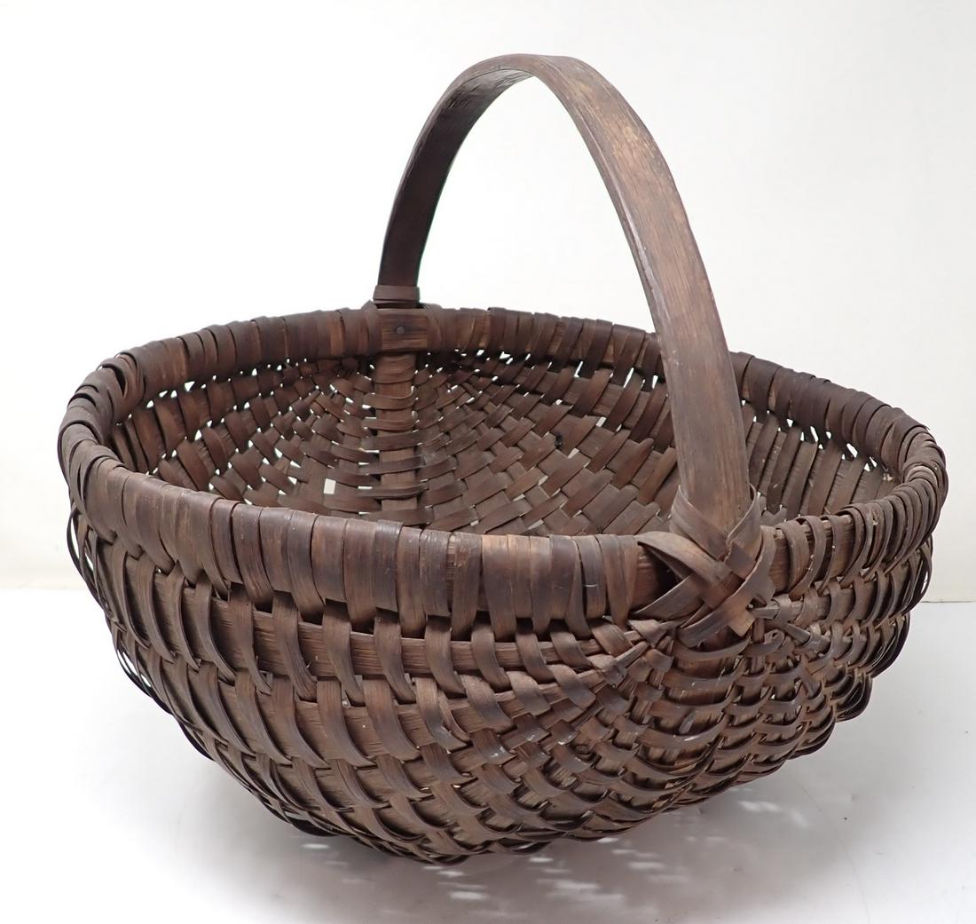 Early Basket: Apprx 15" in diameter and 12" to top of handle