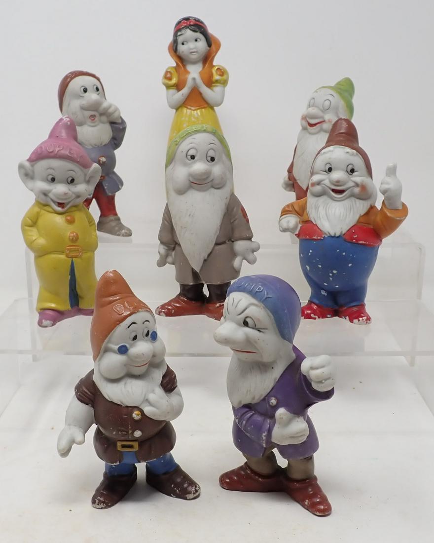Walt Disney Snow White & Seven Dwarfs: Snow White is approx 7" tall. Dwarfs are approx 5" tall. Made of porcelain