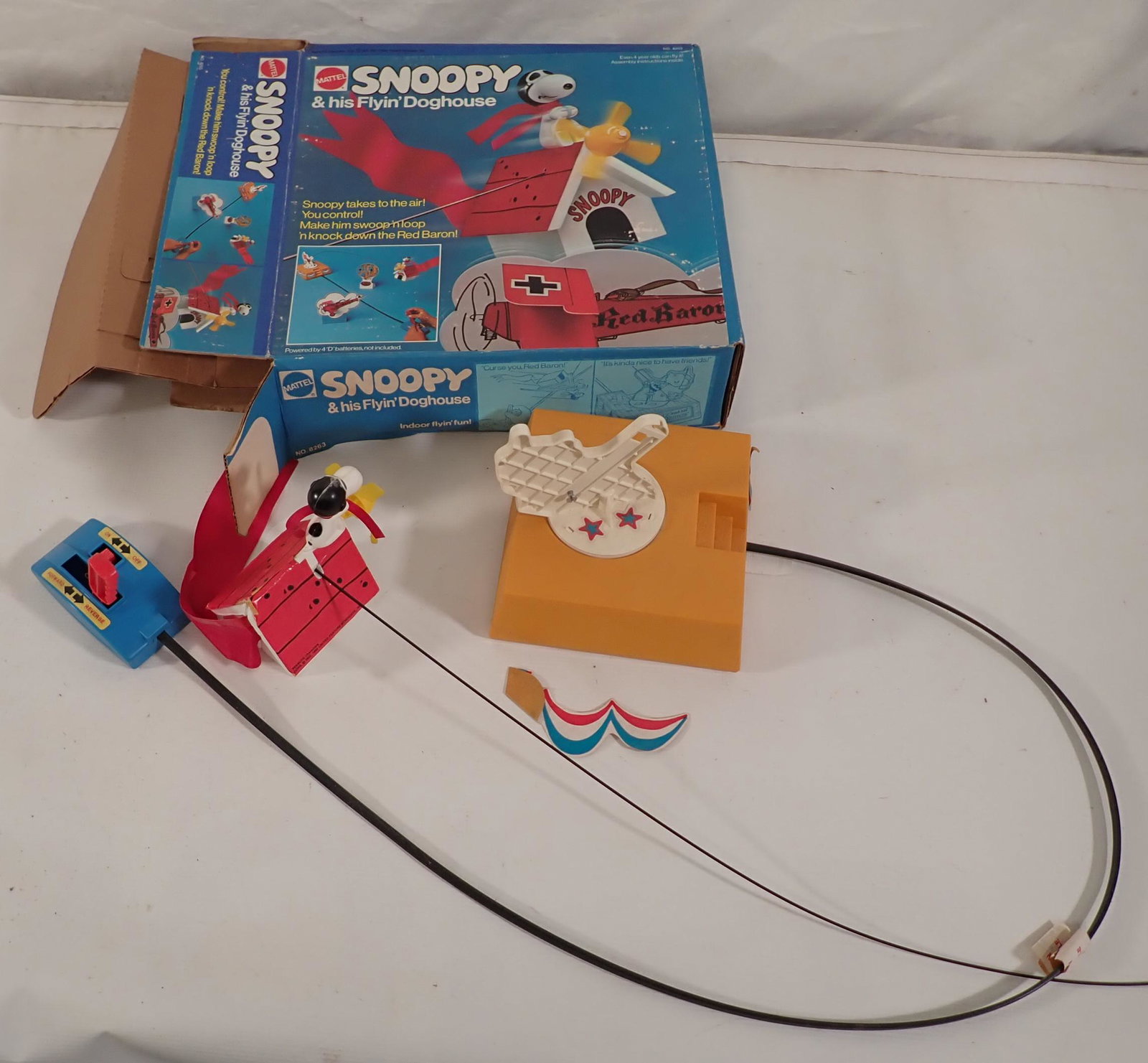 Mattel Snoopy and His Flying Dog House: Battery operated toy, with original box. Comes with all pictured. We do not guarantee it is complete.