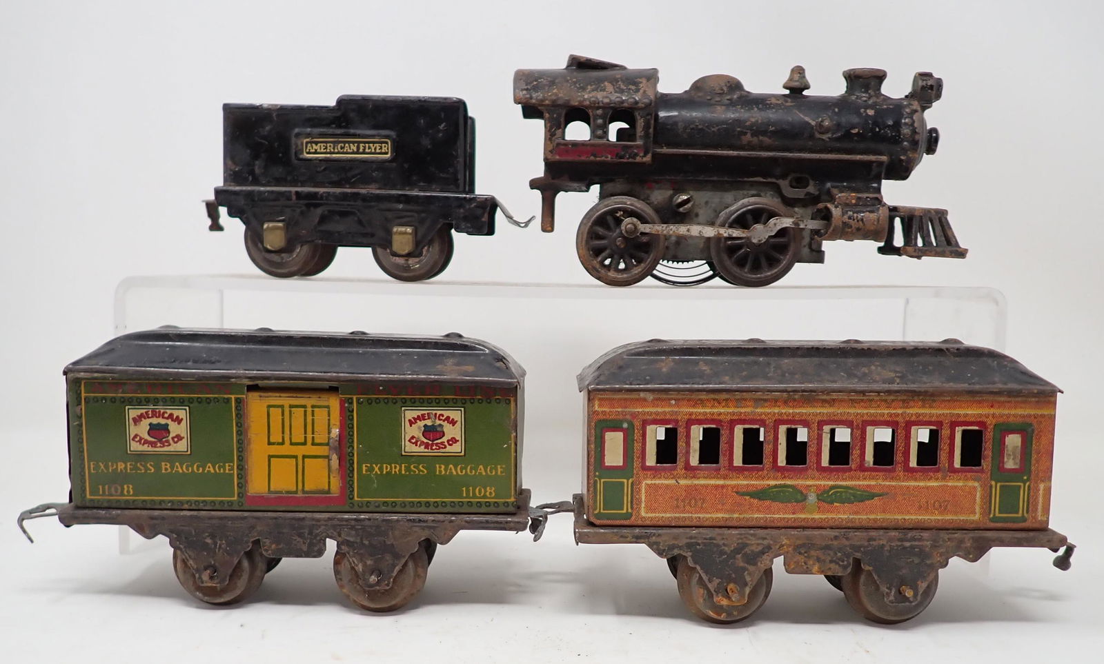 American Flyer Cast Iron Wind Up Loco & Tin Cars: Steam Locomotive is approx 7" long.