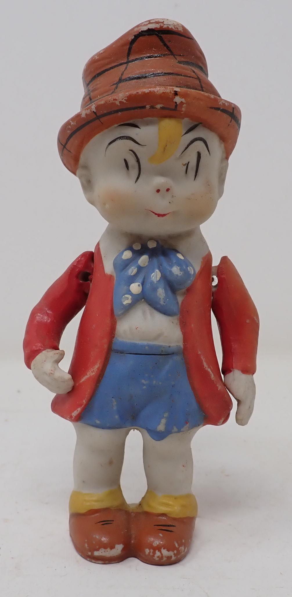 Skippy Percy Crosby Porcelain Figure: Approx 5 1/2" tall and has jointed arms