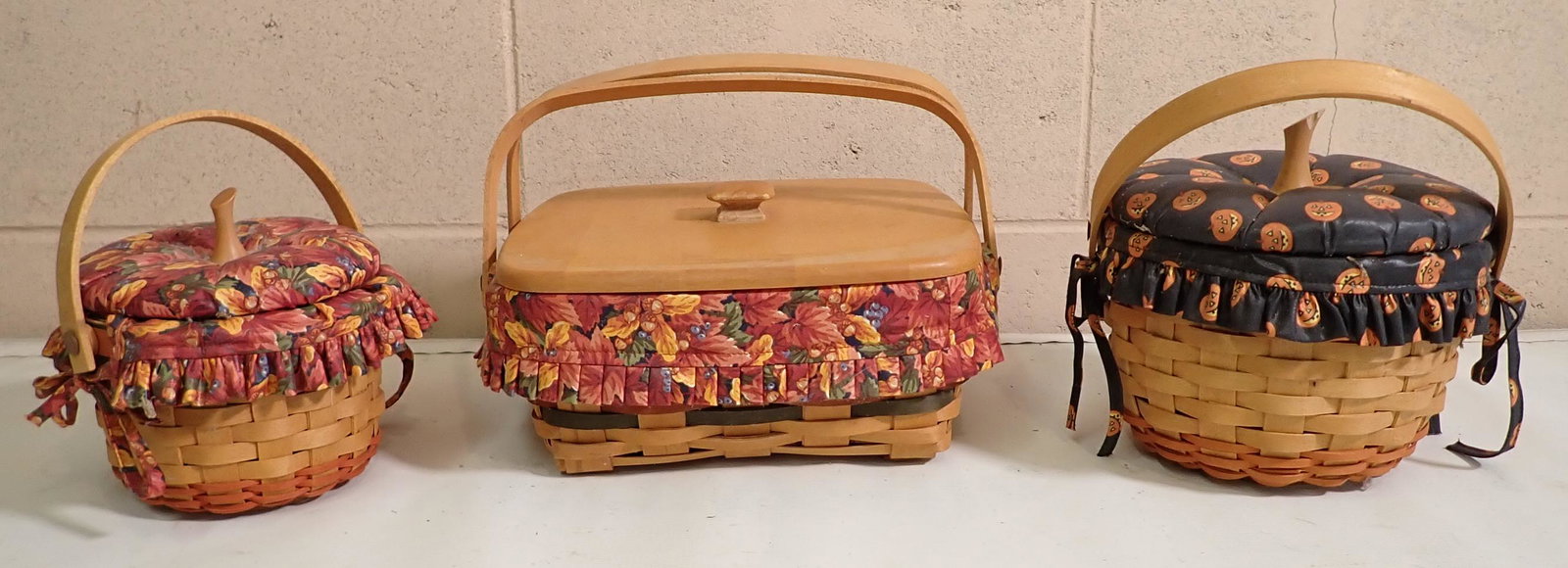 3 Longaberger Baskets: Largest is approx 10 1/2" x 11" x 4 1/2" tall. All have protectors and liners.