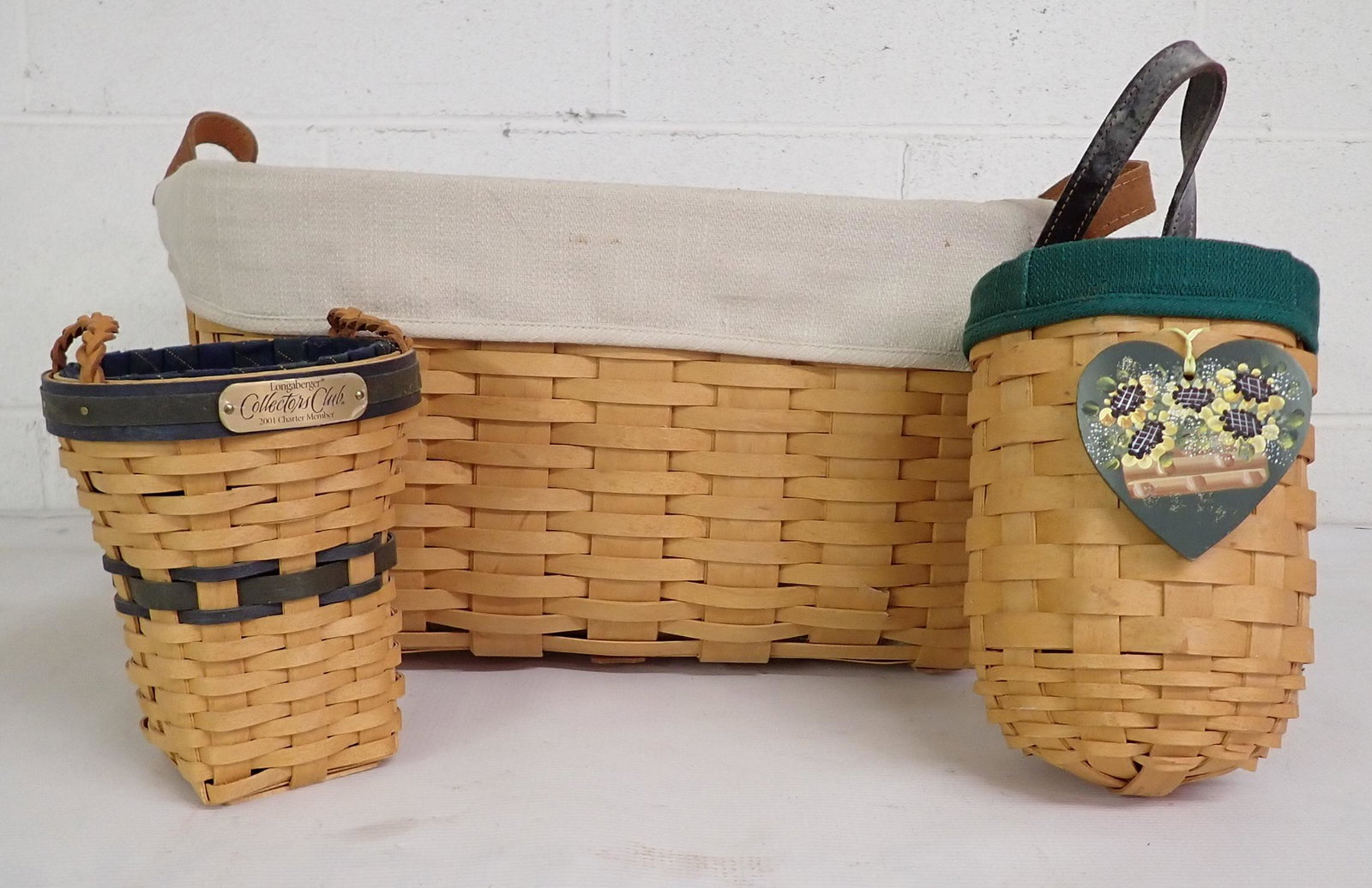3 Longaberger Baskets: Largest is approx 15 1/2" x 17" x 8 1/2" tall.