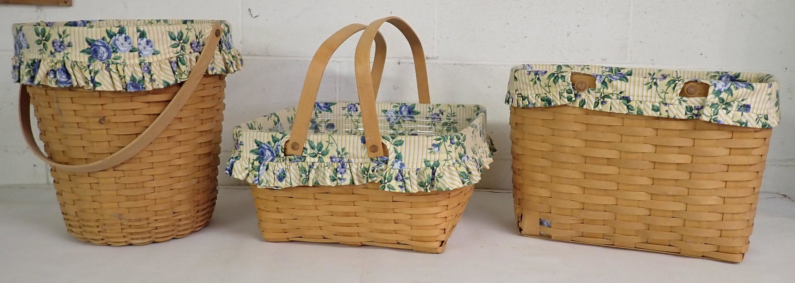 3 Longaberger Baskets: Center one is approx 15" x 15" x 7 1/2" tall. All have protectors and liners