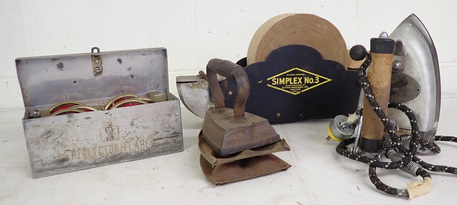 International Harvester Reflector & Irons: Also includes Simplex No. 3 Tape machine. No shipping