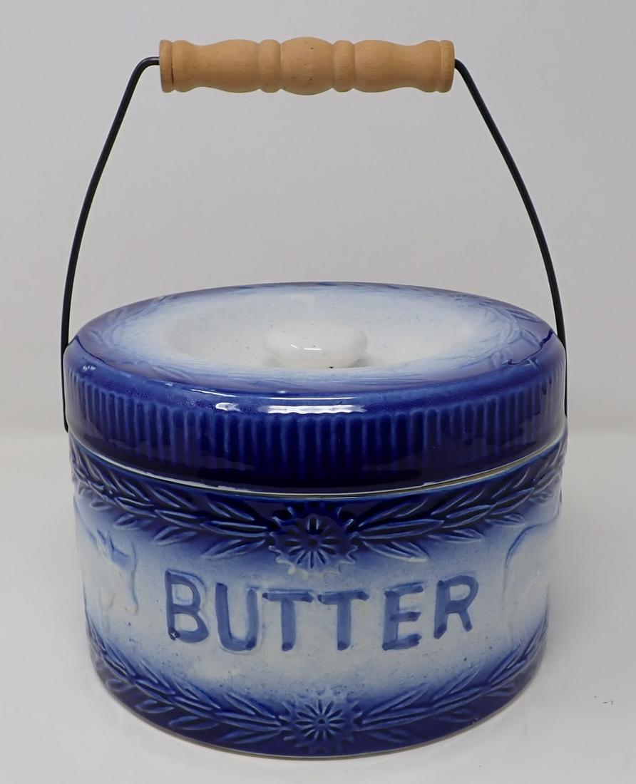 Cow Butter Crock: Approx 7 1/2" in diameter and 5 1/4" tall. This is "newer"