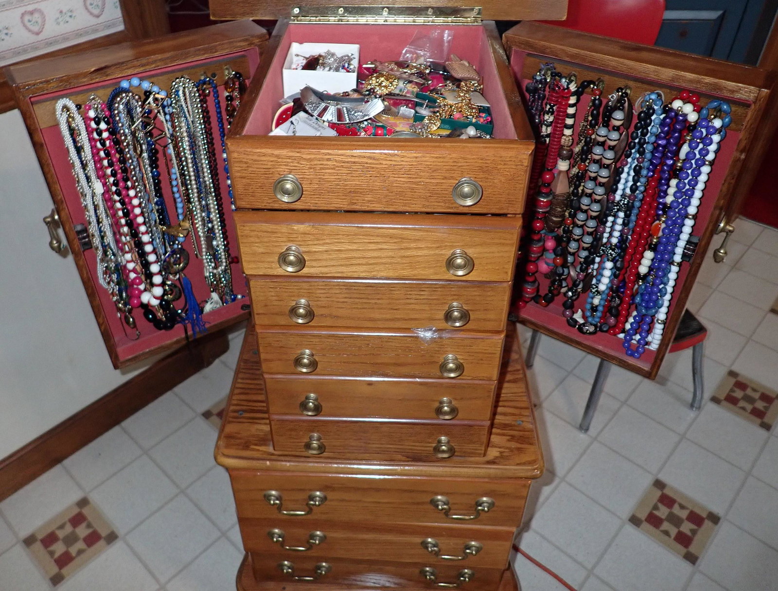 Contents of Costume Jewelry Box: This includes all pictured in jewelry box. Does not include Jewelry box. All this jewelry was dumped in a box ( not organized )